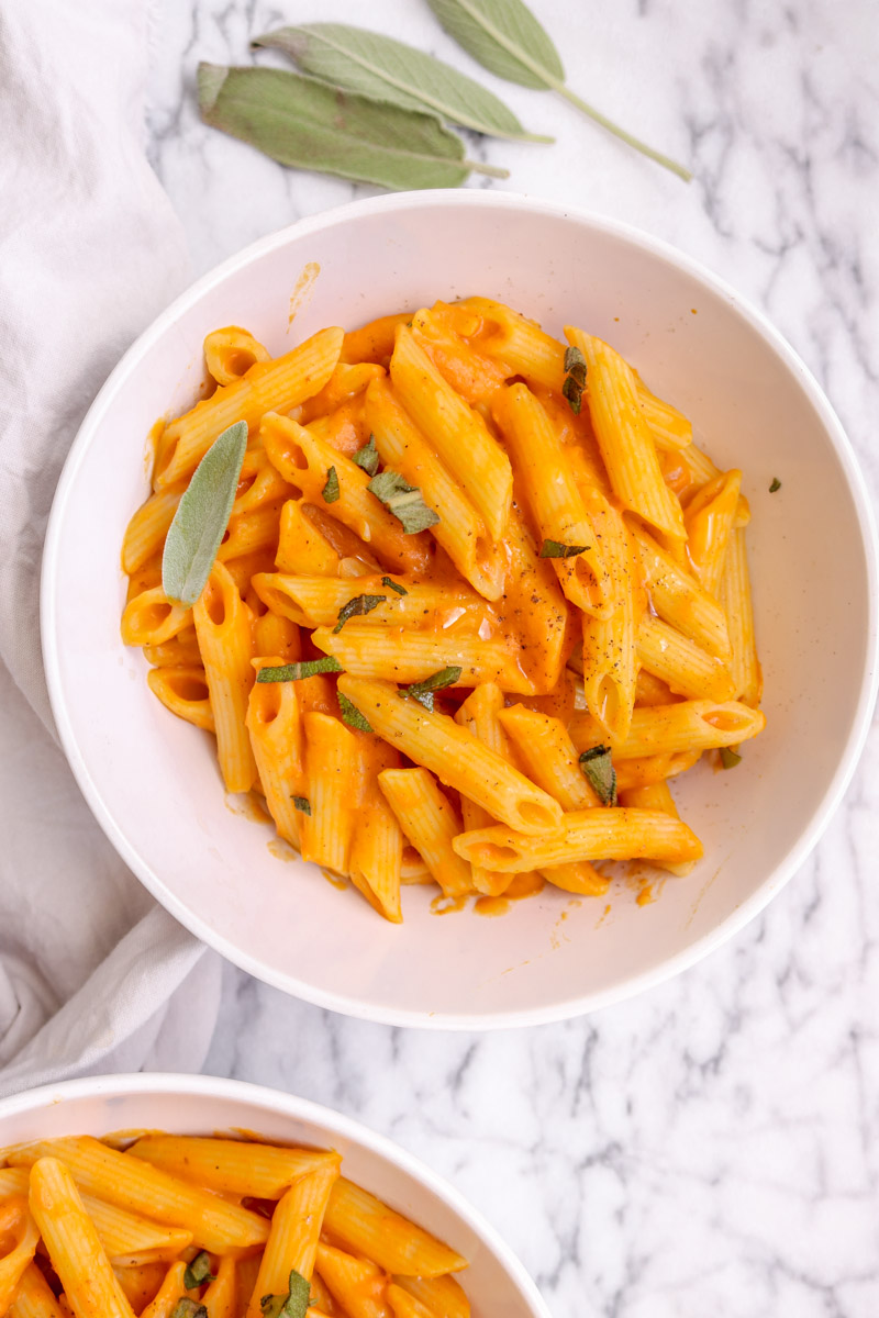 overhead image of creamy vegan pumpkin pasta.
