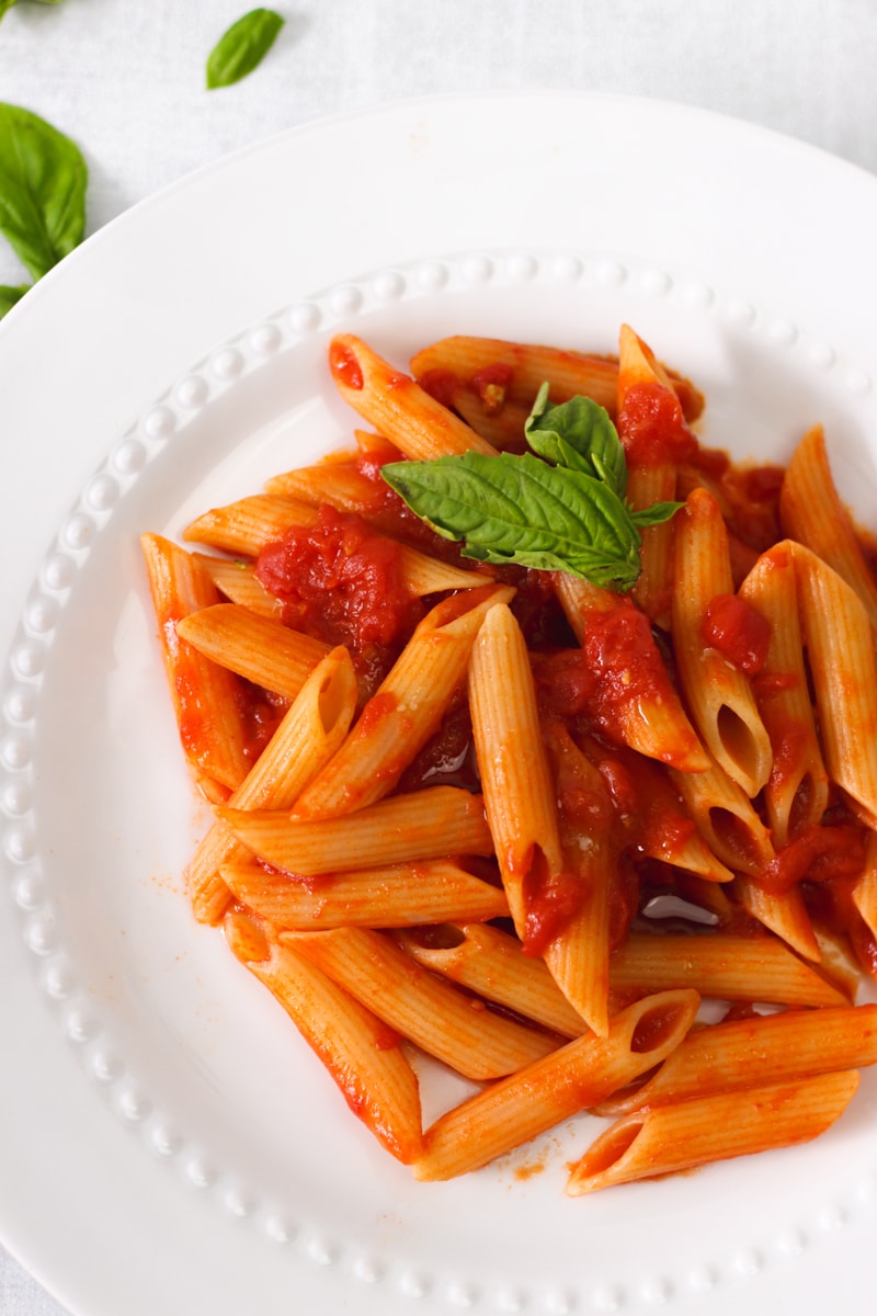 overhead image of easy tomato sauce pasta on a plate.