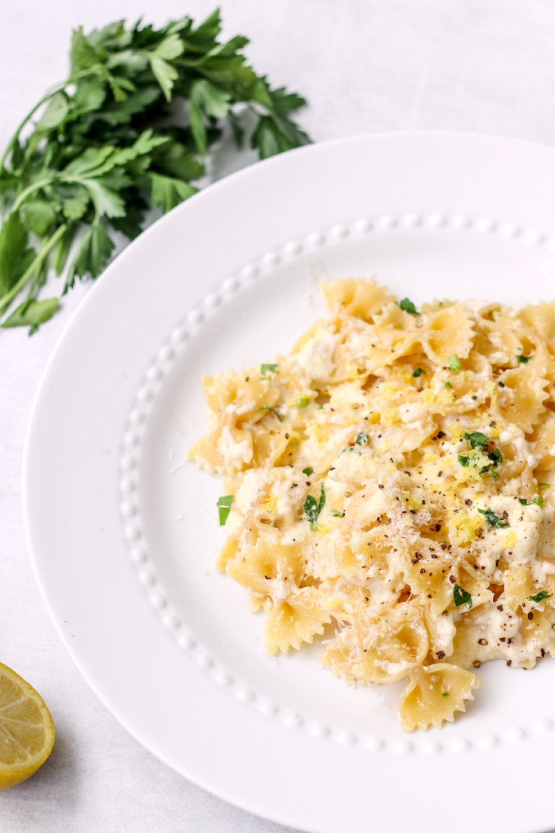 overhead image of easy lemon ricotta pasta on a white plate