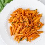 Closeup of creamy tomato pasta.