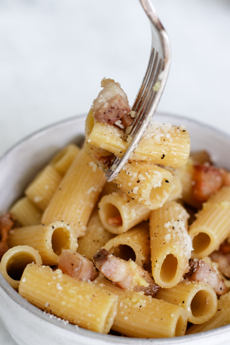 close up image of pasta on a fork. 