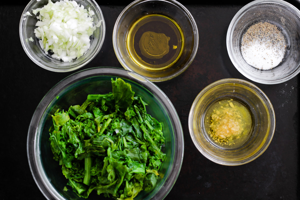 overhead image of ingredients to make pasta with rapini.