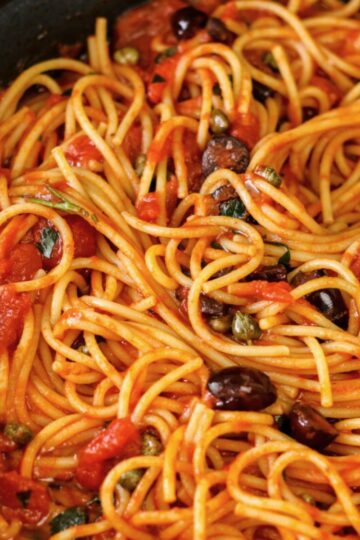 Pasta puttanesca closeup.