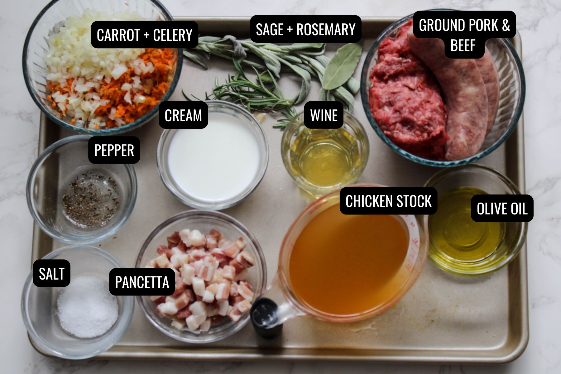 overhead image of ingredients in small glass dishes to make a white ragu. 
