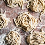 Homemade pici pasta closeup.