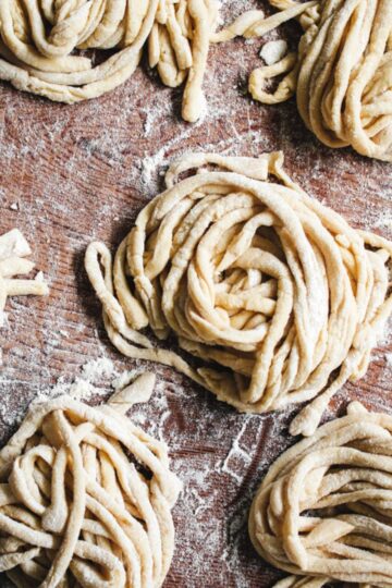 Homemade pici pasta closeup.